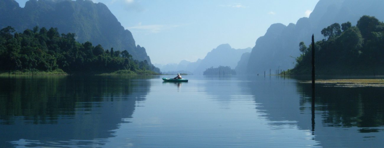 Canva - Man on Boat Under Blue Sky